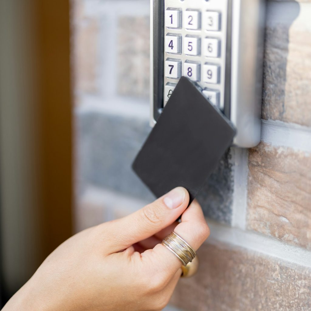 Attaching card to the electronic reader to access the office or apartment